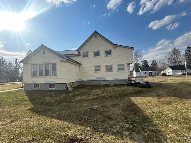 140 Riverside Dr, Utica, NY 13502 - rear view of property with a yard