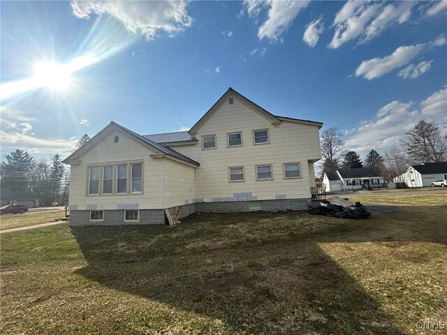 140 Riverside Dr, Utica, NY 13502 - view of home's exterior with a yard