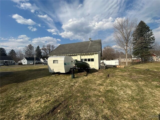140 Riverside Dr, Utica, NY 13502 - view of side of property with an outbuilding and a garage