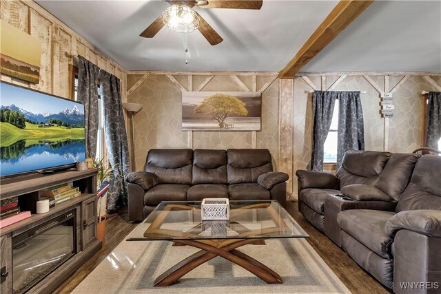living area featuring ceiling fan and wood finished floors