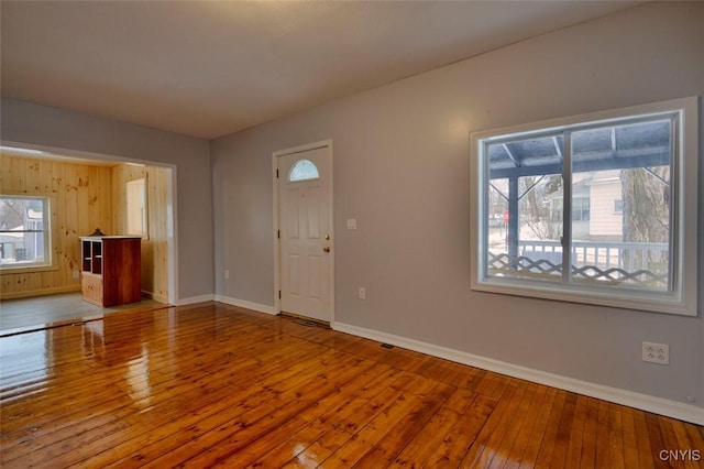 88 Walton St, Alexandria, NY 13607 - entrance foyer with hardwood / wood-style floors, baseboards, and a healthy amount of sunlight