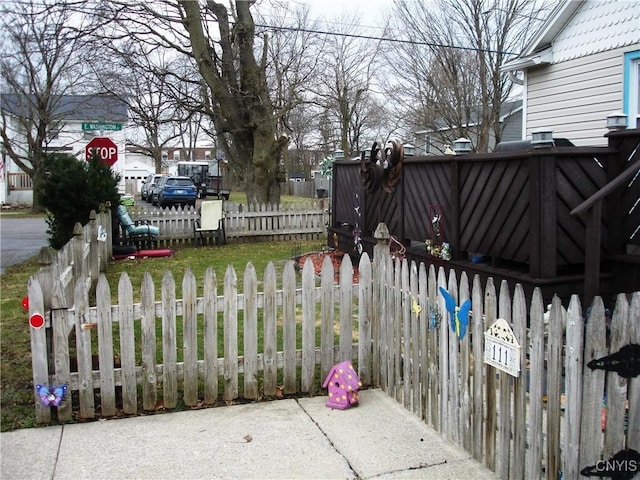 view of gate with fence
