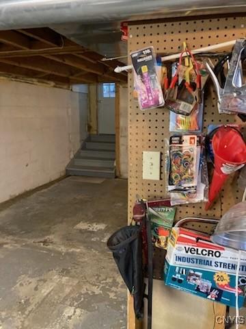 unfinished basement with stairway