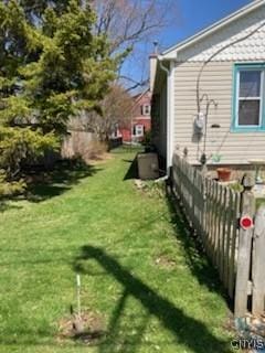 view of home's exterior featuring a yard