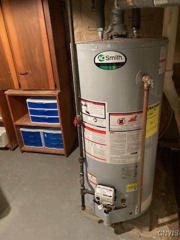 utility room with gas water heater