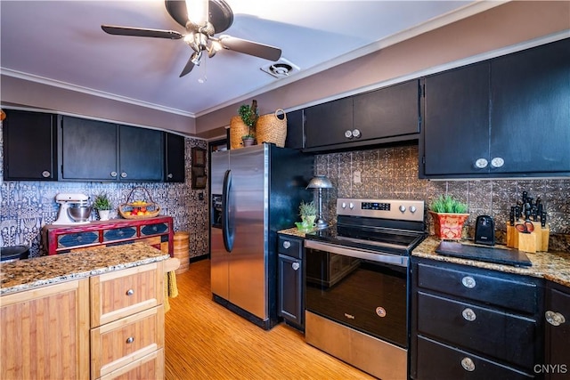 208 Eatonville Rd, Little Falls, NY 13365 - kitchen featuring appliances with stainless steel finishes, a ceiling fan, crown molding, light wood finished floors, and backsplash