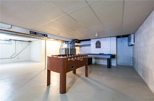 208 Eatonville Rd, Little Falls, NY 13365 - recreation room with concrete floors, heating unit, and a drop ceiling