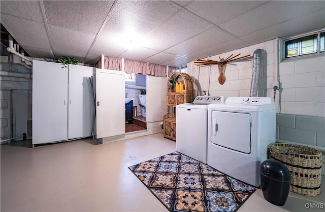 208 Eatonville Rd, Little Falls, NY 13365 - laundry room with concrete block wall and washing machine and clothes dryer