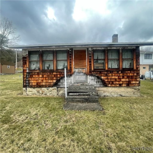 6235 SW Shr, Canadice, NY 14471 - back of property featuring a yard and a chimney