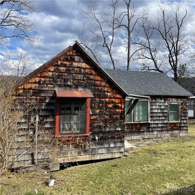 6235 SW Shr, Canadice, NY 14471 - view of front of property with a front lawn and roof with shingles