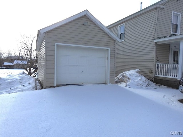 view of snow covered garage