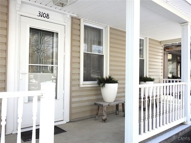 entrance to property with a porch