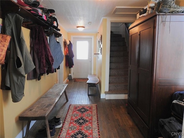 mudroom with baseboards, dark wood-style flooring, and ornamental molding