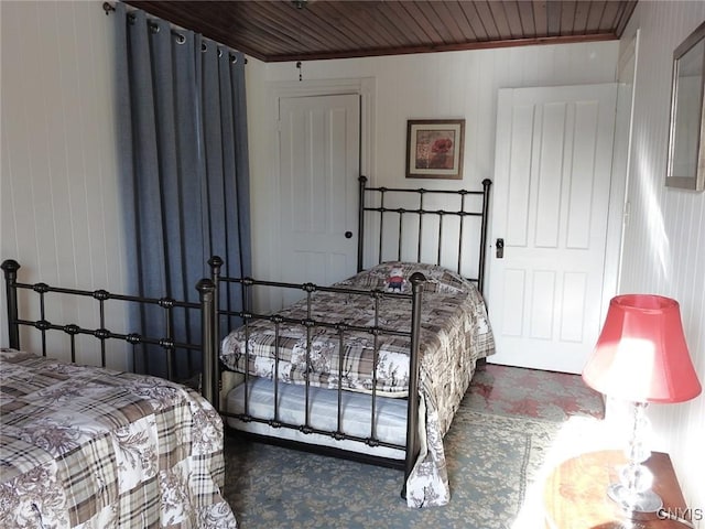 bedroom with wood ceiling