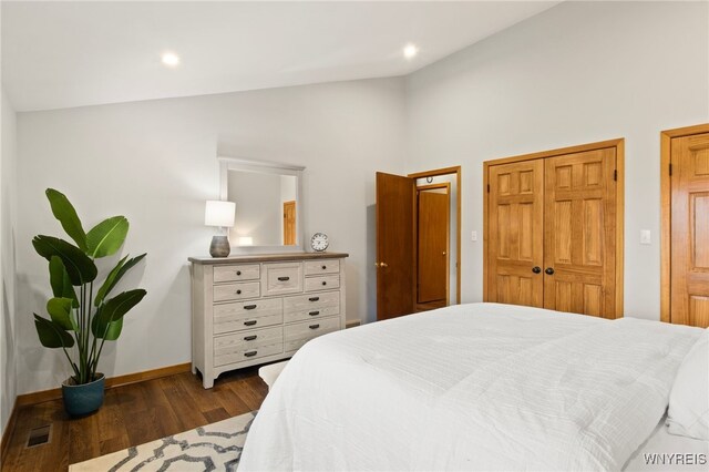 6741 Cole Rd, Orchard Park, NY 14127 - bedroom featuring baseboards, vaulted ceiling, recessed lighting, and dark wood finished floors