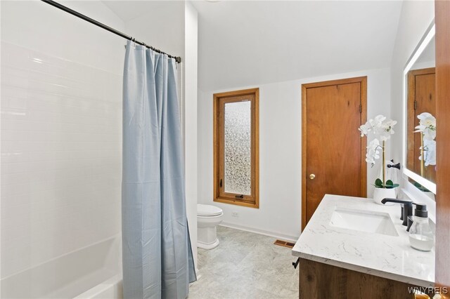 6741 Cole Rd, Orchard Park, NY 14127 - bathroom featuring toilet, vanity, and shower / bath combo with shower curtain