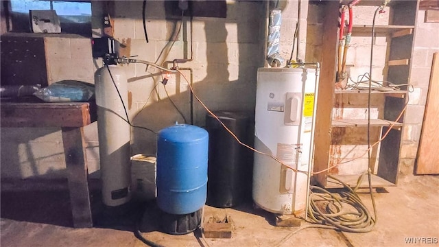 utility room with water heater
