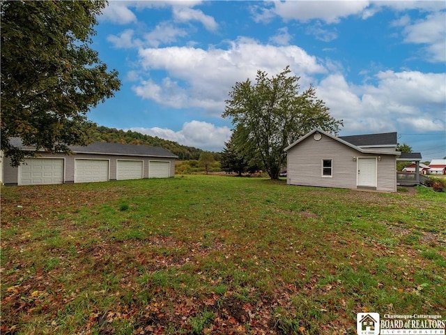 673 Ivory Rd, Carroll, NY 14738 - view of yard with an outbuilding and a detached garage