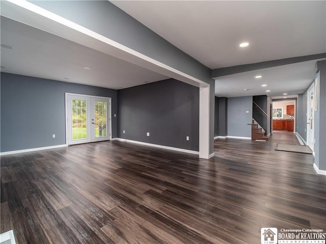673 Ivory Rd, Carroll, NY 14738 - unfurnished living room with dark wood finished floors, stairs, recessed lighting, and baseboards
