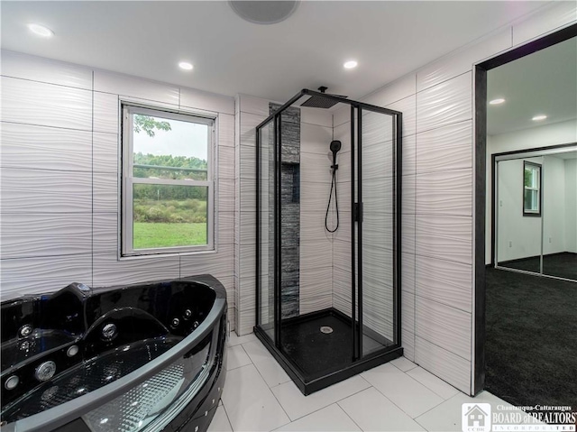 673 Ivory Rd, Carroll, NY 14738 - full bath with recessed lighting, a jetted tub, tile walls, and a shower stall