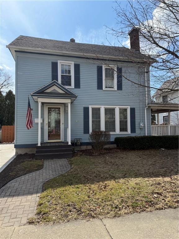 507 W Hudson St, Elmira-City, NY 14904 - colonial home with a shingled roof and a chimney