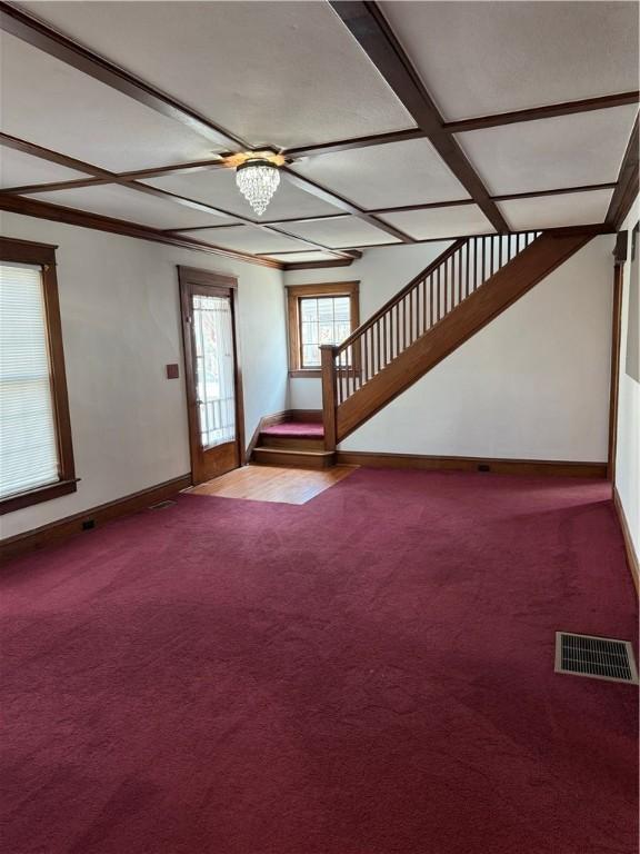 507 W Hudson St, Elmira-City, NY 14904 - foyer entrance with coffered ceiling, stairway, baseboards, visible vents, and carpet