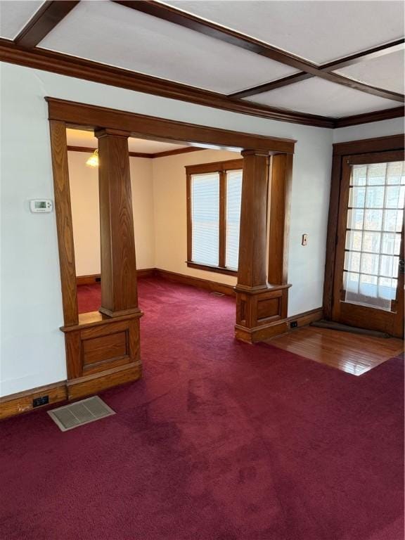 507 W Hudson St, Elmira-City, NY 14904 - unfurnished living room with ornate columns, crown molding, visible vents, and carpet