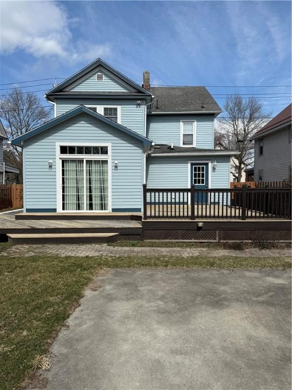 507 W Hudson St, Elmira-City, NY 14904 - rear view of house featuring fence and a wooden deck