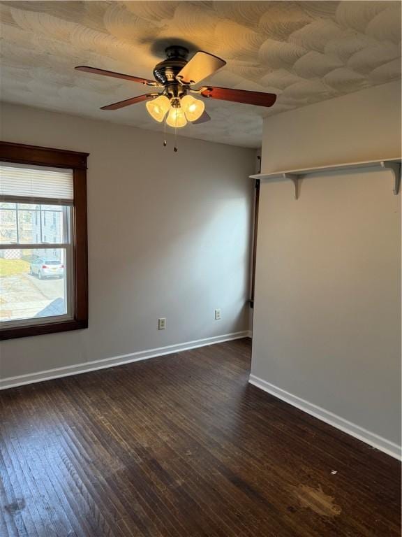 507 W Hudson St, Elmira-City, NY 14904 - interior space with baseboards, ceiling fan, dark wood-type flooring, and a textured ceiling