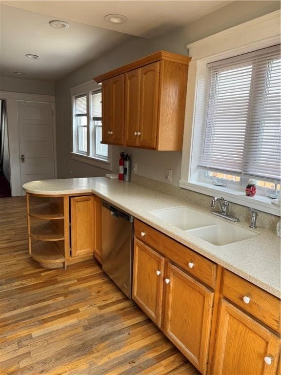 507 W Hudson St, Elmira-City, NY 14904 - kitchen with light countertops, dishwasher, a sink, open shelves, and light wood-type flooring