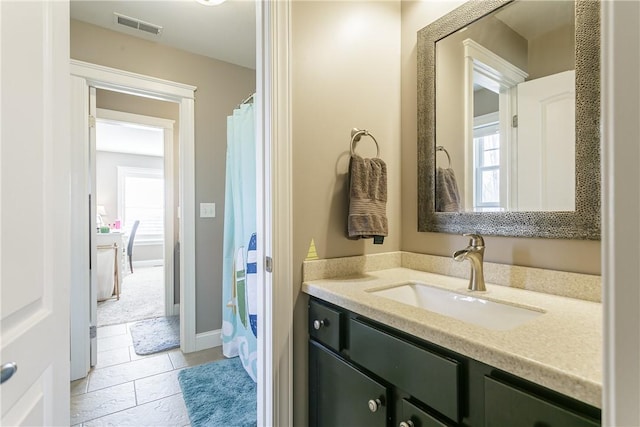 5027 Wyffels Rd, Canandaigua-Town, NY 14424 - full bath with visible vents, plenty of natural light, and vanity