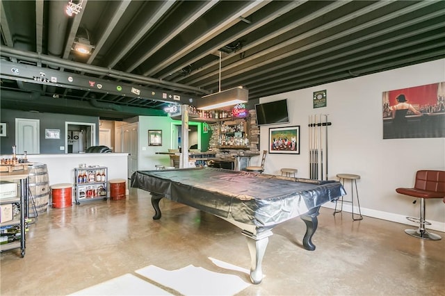 5027 Wyffels Rd, Canandaigua-Town, NY 14424 - playroom with finished concrete flooring, pool table, and a dry bar