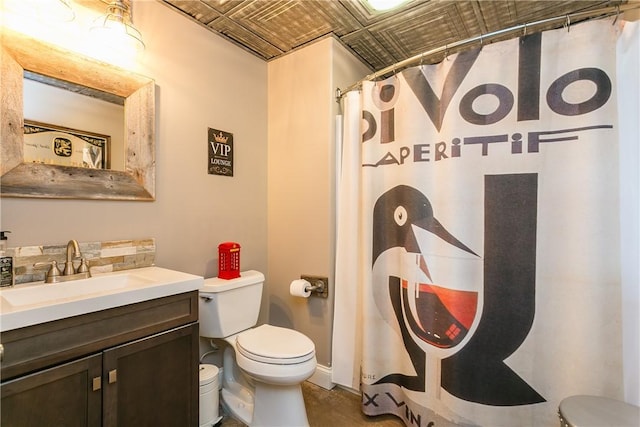 5027 Wyffels Rd, Canandaigua-Town, NY 14424 - bathroom with vanity, baseboards, an ornate ceiling, and toilet