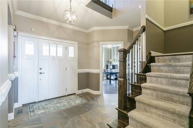 5027 Wyffels Rd, Canandaigua-Town, NY 14424 - entryway with baseboards, stone tile floors, crown molding, and stairway