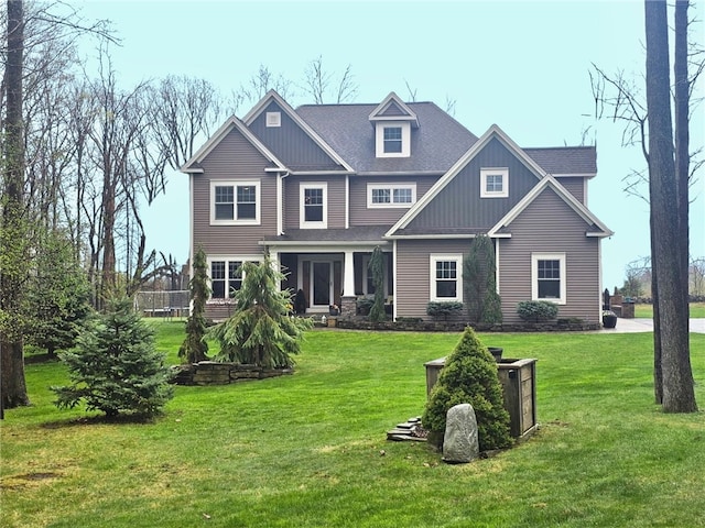 5027 Wyffels Rd, Canandaigua-Town, NY 14424 - craftsman-style house with board and batten siding and a front lawn