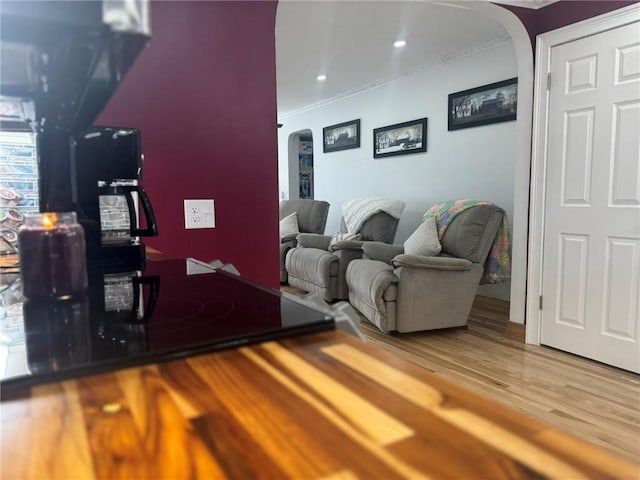 612 Oswegatchie Rd, Palatine, NY 13428 - living room with arched walkways, wood finished floors, and recessed lighting