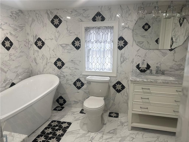 612 Oswegatchie Rd, Palatine, NY 13428 - bathroom with a soaking tub, vanity, toilet, and marble finish flooring