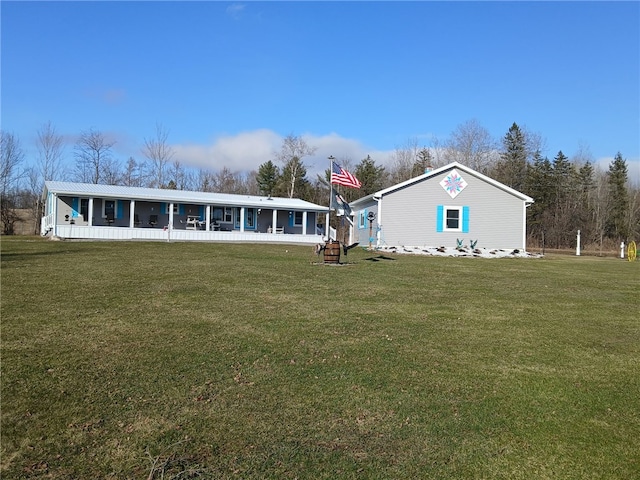 612 Oswegatchie Rd, Palatine, NY 13428 - rear view of house featuring a yard