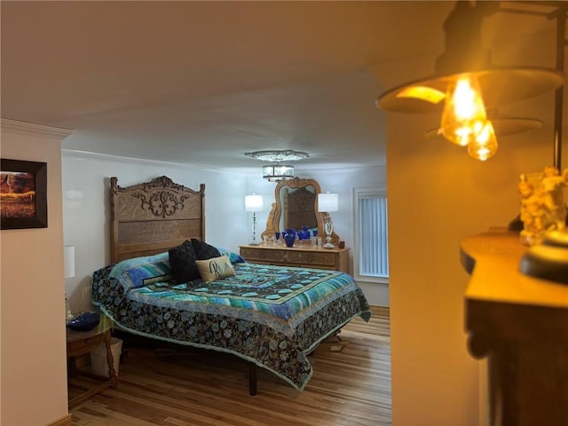 612 Oswegatchie Rd, Palatine, NY 13428 - bedroom featuring ornamental molding and wood finished floors