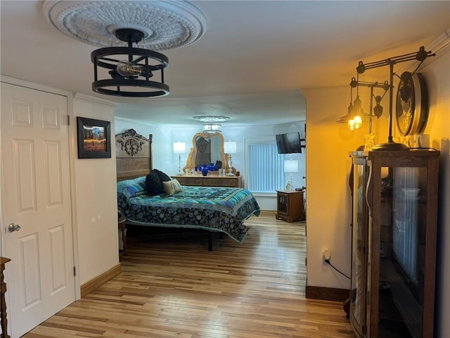 612 Oswegatchie Rd, Palatine, NY 13428 - bedroom featuring wood-type flooring and baseboards