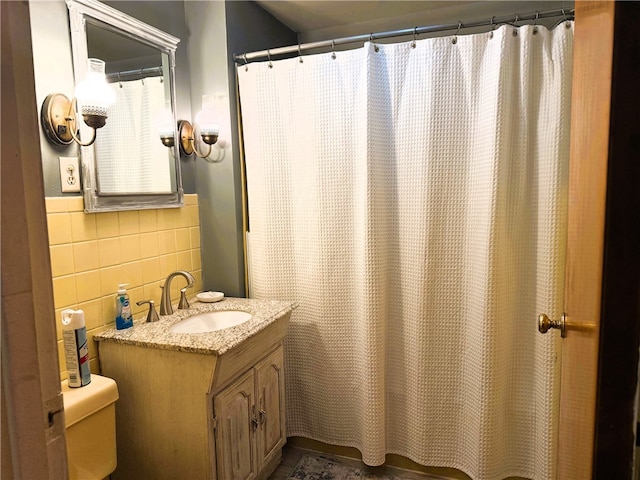605 Watkins Rd, Horseheads, NY 14845 - full bath with toilet, vanity, a shower with shower curtain, and tile walls