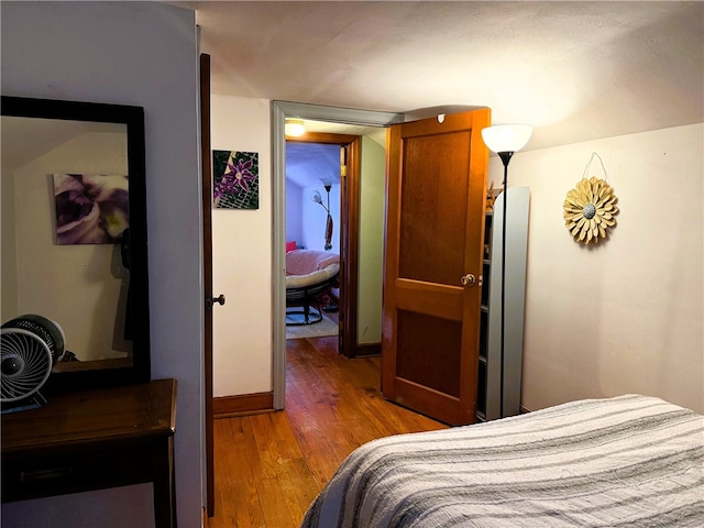 605 Watkins Rd, Horseheads, NY 14845 - bedroom with baseboards and wood finished floors
