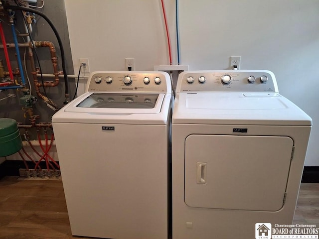 15 E Summit St, Busti, NY 14750 - laundry room featuring wood finished floors, independent washer and dryer, and laundry area