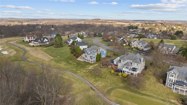 aerial view with a residential view and view of golf course