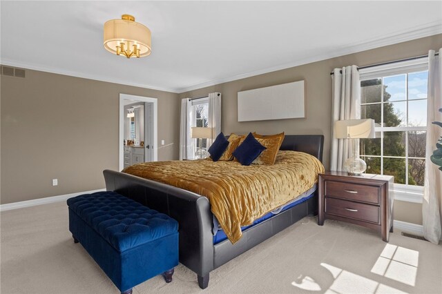 bedroom featuring carpet flooring, visible vents, multiple windows, and baseboards