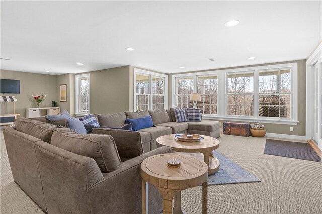 carpeted living room with baseboards and recessed lighting