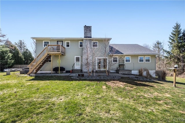 1905 Stump Rd, Skaneateles, NY 13108 - back of house with a chimney, stairway, a yard, and a patio area