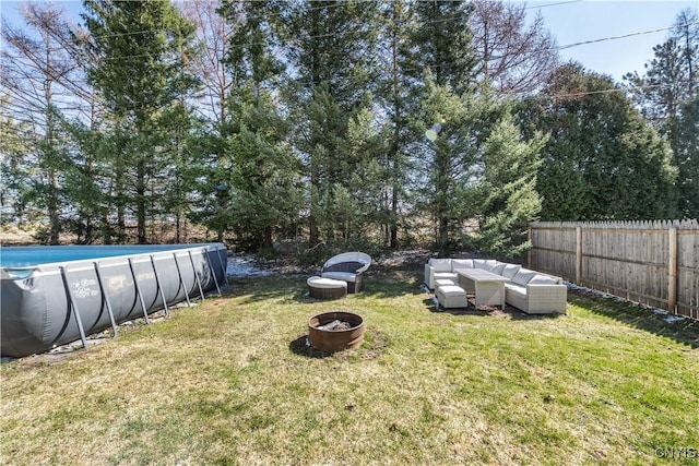 1905 Stump Rd, Skaneateles, NY 13108 - view of yard with a fenced backyard, an outdoor pool, and an outdoor living space with a fire pit