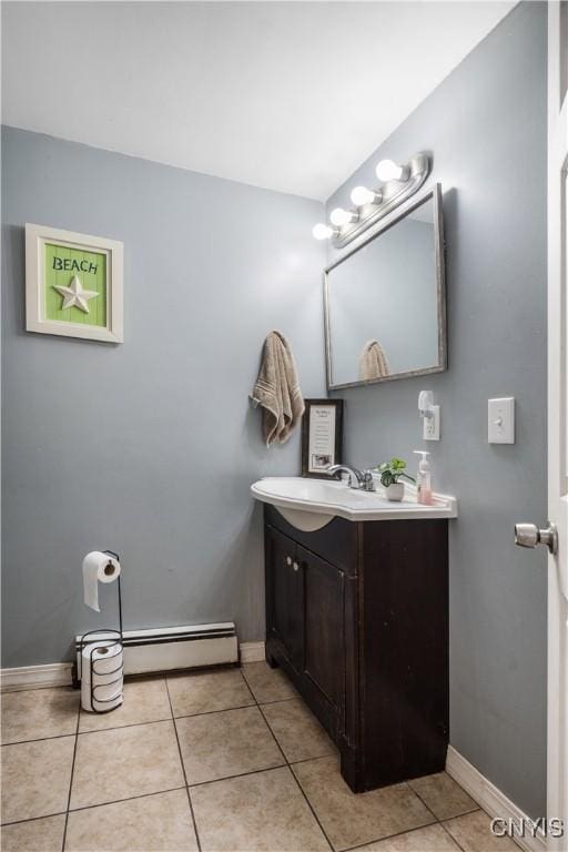 1905 Stump Rd, Skaneateles, NY 13108 - bathroom with a baseboard radiator, tile patterned flooring, vanity, and baseboards