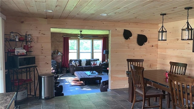 376 State Route 34, Hannibal, NY 13074 - dining space with wood walls and wood ceiling